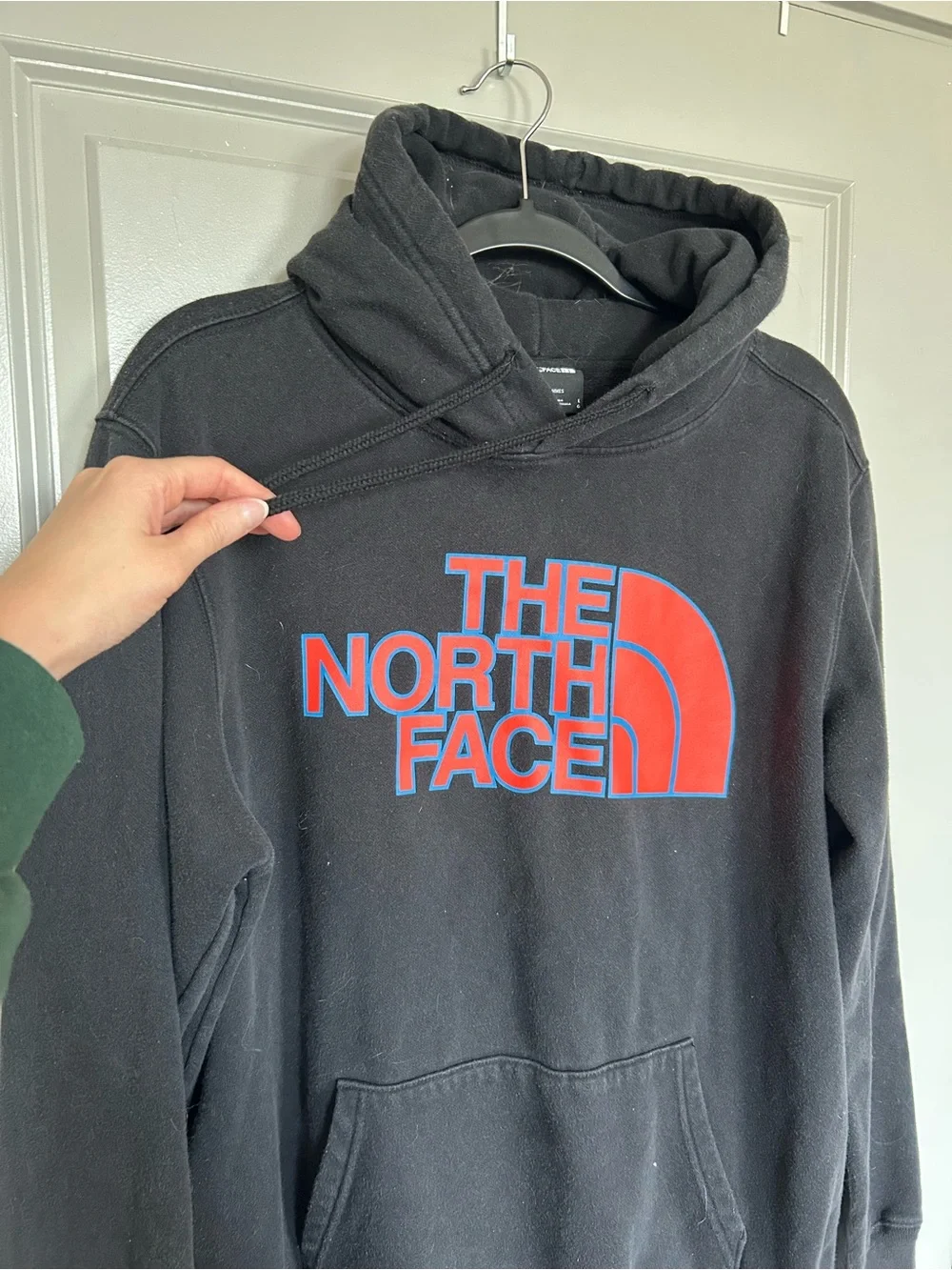 The North Face Black Pullover Hoodie with Red Logo